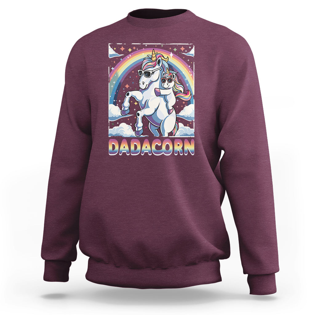 Purple sweatshirt with unicorn graphic and rainbow arch on the front