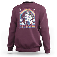 Purple sweatshirt with unicorn graphic and rainbow arch on the front