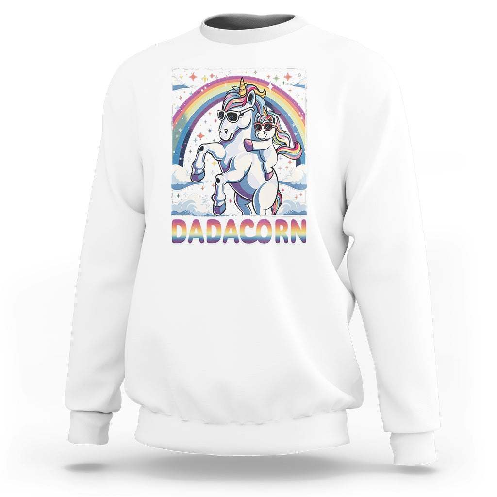 White sweatshirt with unicorn graphic and rainbow arch on the front