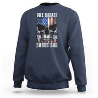 Navy crewneck sweatshirt with “One Badass Bonus Dad” skull graphic on back