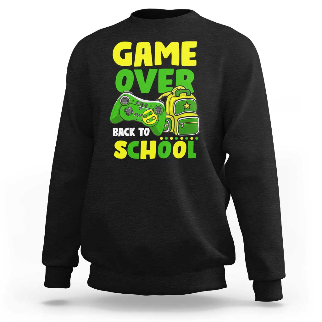 Black crewneck sweatshirt with “GAME OVER” and game-themed “BACK TO SCHOOL” graphic