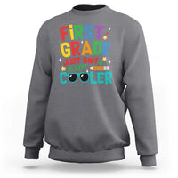 Gray kids sweatshirt with colorful “First Grade” “Just Got A Lot Cooler” graphic