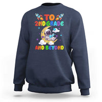 Navy sweatshirt with astronaut graphic and text “To 2nd grade and beyond”