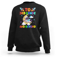 Black sweatshirt with astronaut graphic and “To 3rd Grade and Beyond” text