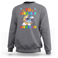 Charcoal gray sweatshirt with astronaut graphic and “To 3rd Grade and Beyond” text