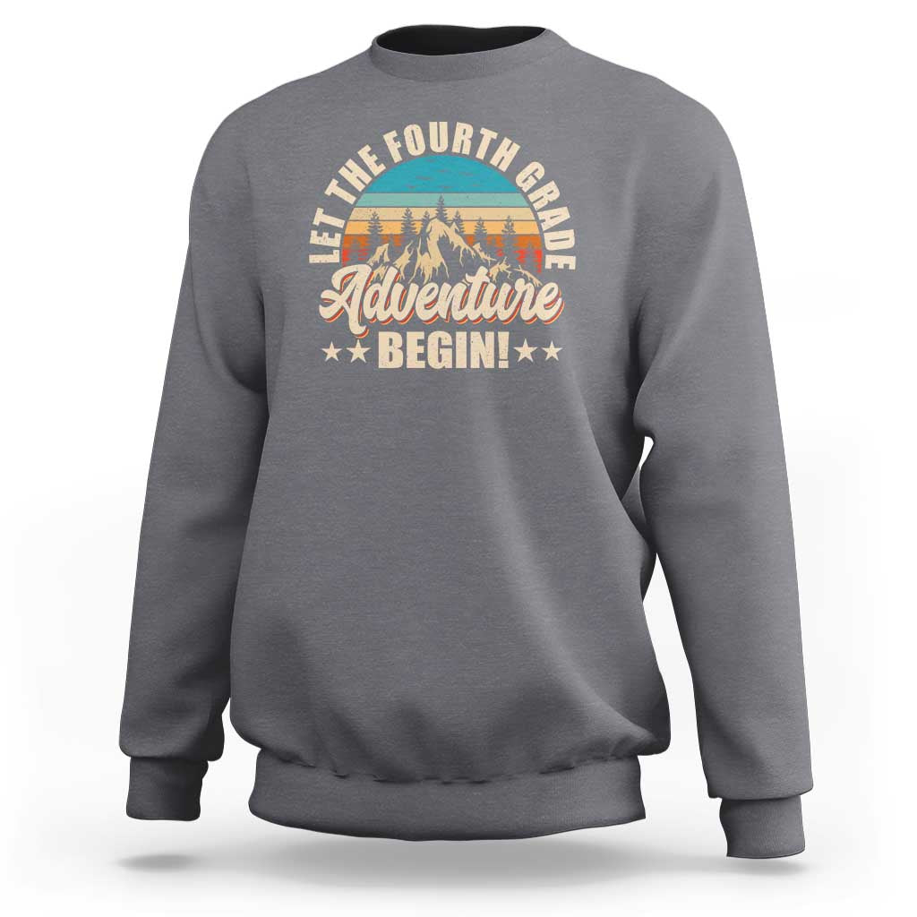 Charcoal crewneck sweatshirt with front “Adventure Begin” graphic and animal illustration.