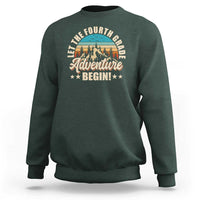 Dark forest green crewneck sweatshirt with front “Adventure Begin” graphic and animal illustration.