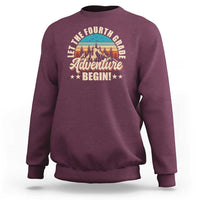 Maroon crewneck sweatshirt with front “Adventure Begin” graphic and animal illustration.