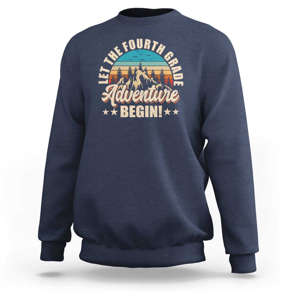 Navy crewneck sweatshirt with front “Adventure Begin” graphic and animal illustration.