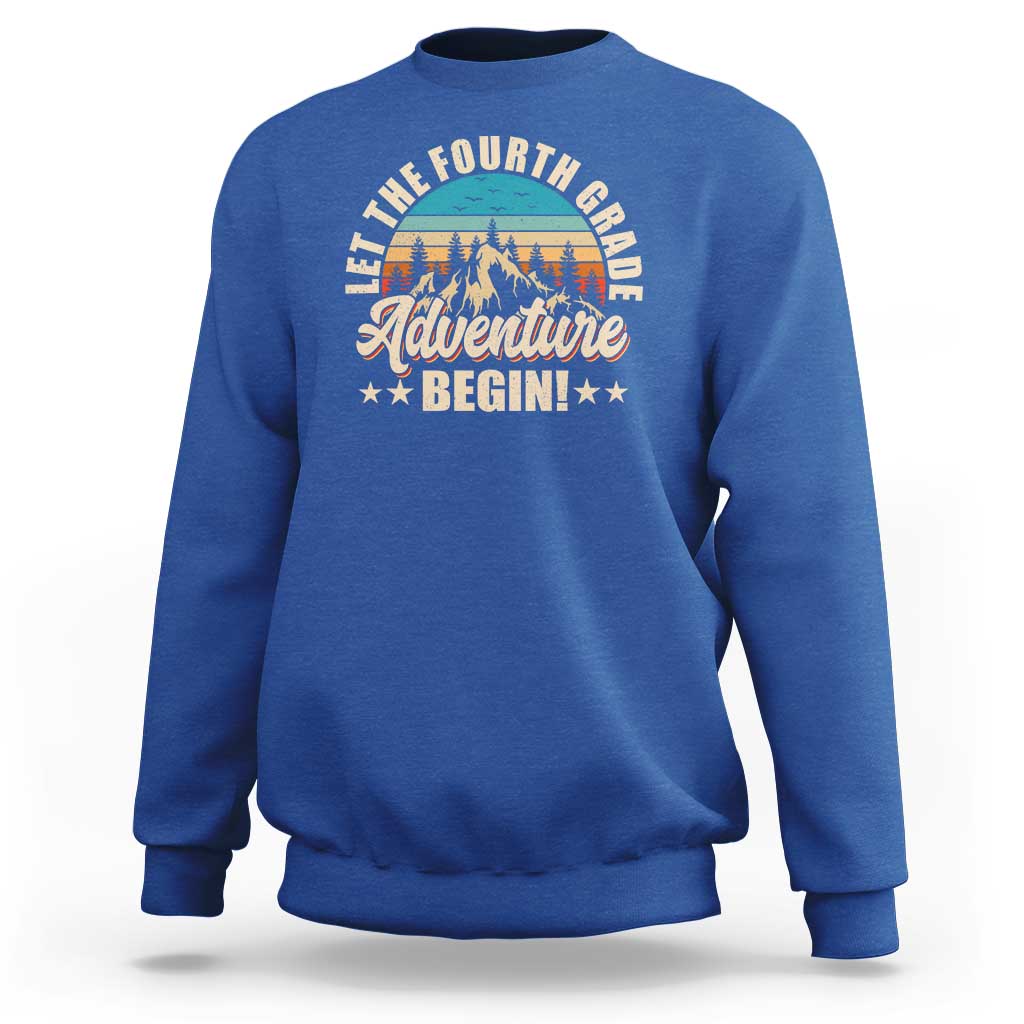 Royal blue crewneck sweatshirt with front “Adventure Begin” graphic and animal illustration.