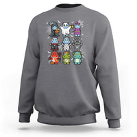 Charcoal gray kids Halloween sweatshirt with cute cartoon hippo lineup graphic
