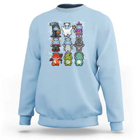 Light blue kids Halloween sweatshirt with cute cartoon hippo lineup graphic