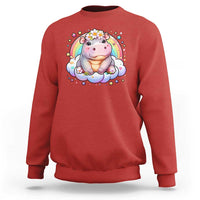 Red baby hippo sweatshirt with pastel rainbow and flower graphic on front