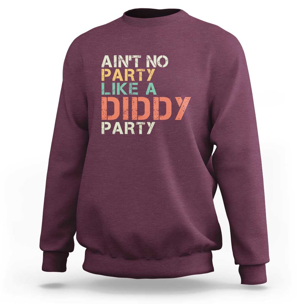 Maroon crewneck sweatshirt with “Ain’t No Party Like a Diddy Party” front graphic