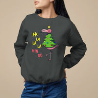 Dark sweatshirt with flamingo Christmas tree graphic and “FA LA LA MIN GO” colorful text