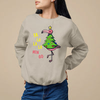 Sand cream sweatshirt with flamingo Christmas tree graphic and “FA LA LA MIN GO” text