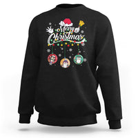 Black crewneck sweatshirt with “Merry Christmas” penguin ornaments graphic on front