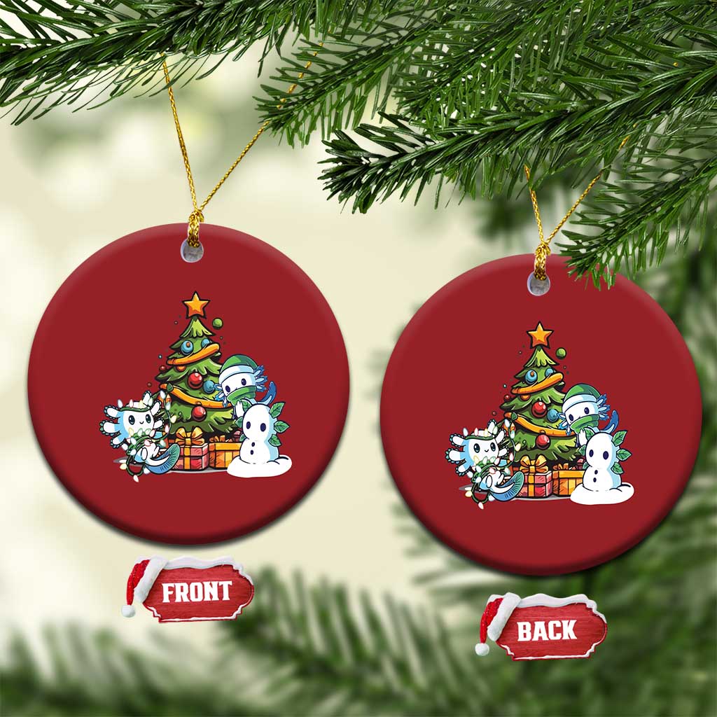 Pair of red round axolotl Christmas ornaments with tree scene, front and back tags
