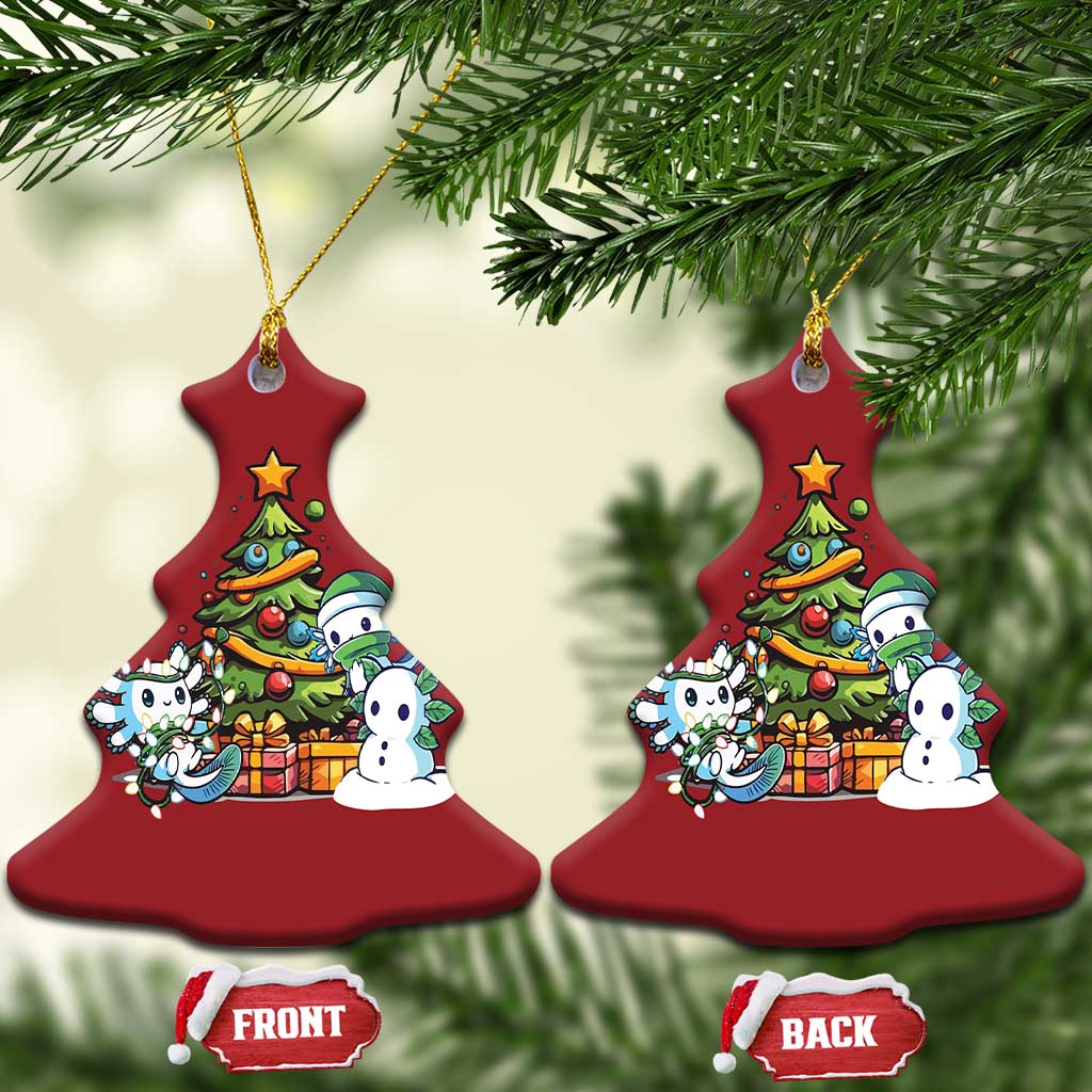 Pair of red Christmas-tree-shaped axolotl ornaments with tree scene, front and back tags