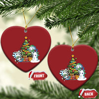 Pair of red heart axolotl Christmas ornaments with tree scene, front and back tags