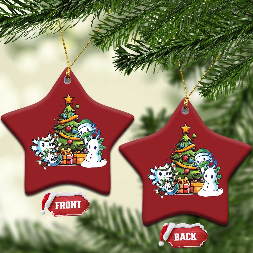 Pair of red star axolotl Christmas ornaments with tree scene, front and back tags