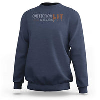 Navy crewneck sweatshirt with CHOCLIT “100% MELANIN” chest print