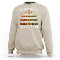 Sand crewneck sweatshirt with 'NEVER APOLOGIZE' and 'BLACK PRIDE OR BLACK SKIN' print
