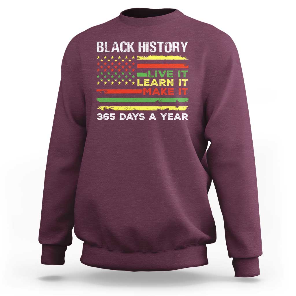 Maroon crewneck sweatshirt with 'BLACK HISTORY' text and 'LIVE IT LEARN IT MAKE IT' print.