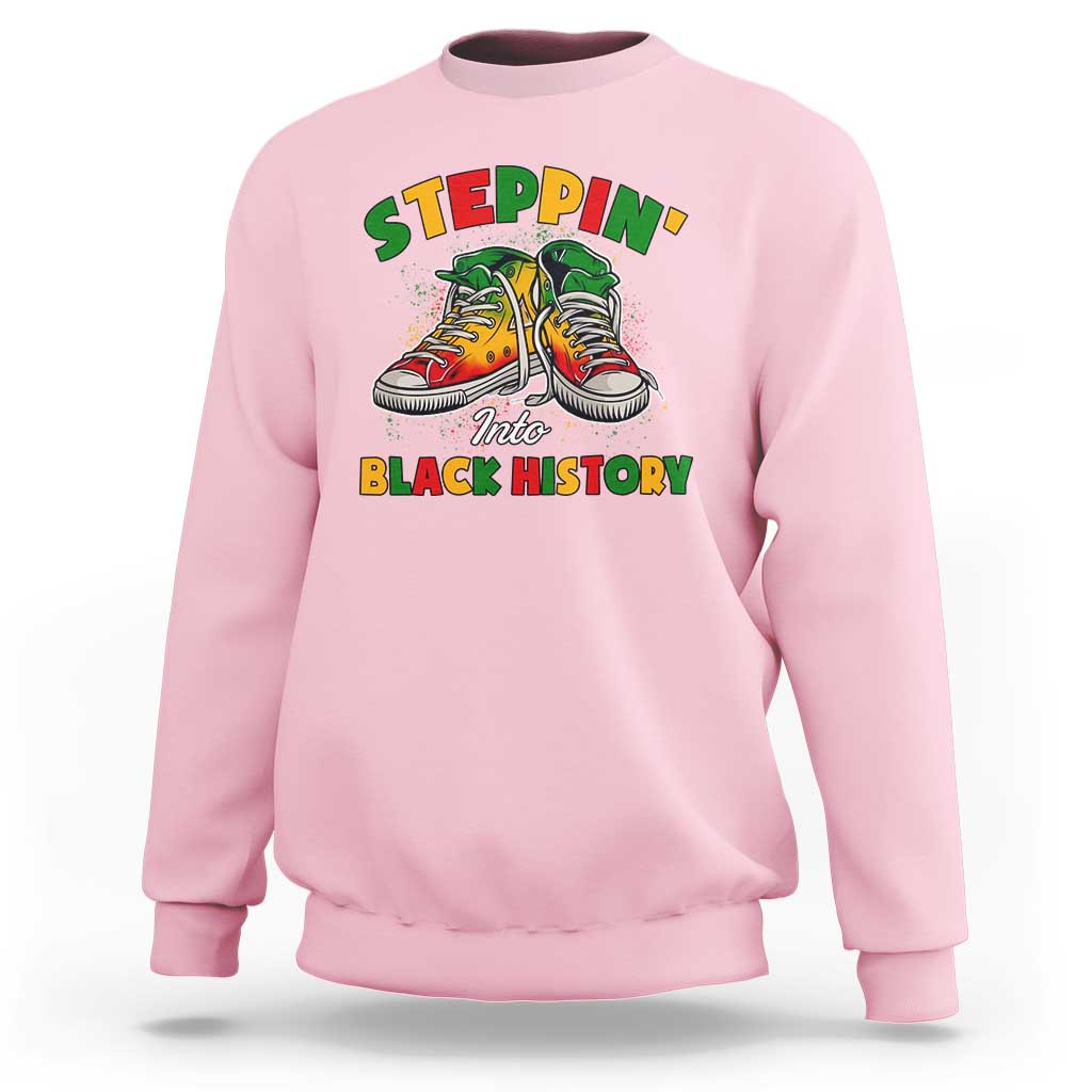 Light pink crewneck sweatshirt with colorful 'Steppin' Into Black History' graphic