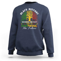 Navy crewneck sweatshirt with front graphic tree and “Inspiring the Future” text