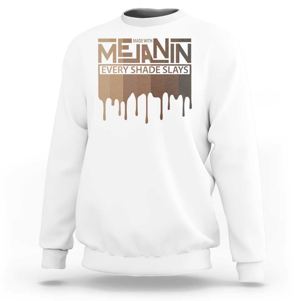 White crewneck sweatshirt with “Every Shade Slays” chest graphic