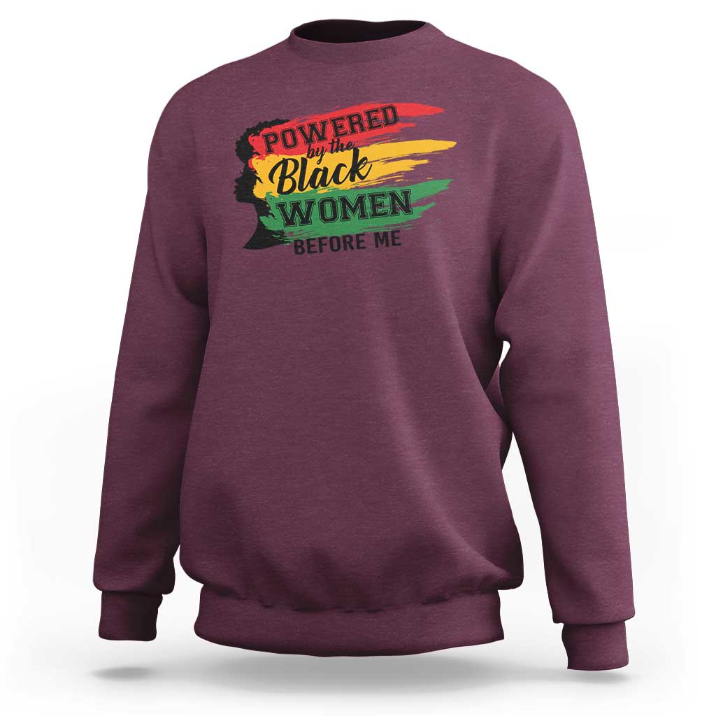 Maroon crewneck sweatshirt with colorful 'Powered by the Black Women Before Me' graphic