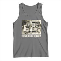 Black graphic tank top with "EDUCATION IS FREEDOM" front print