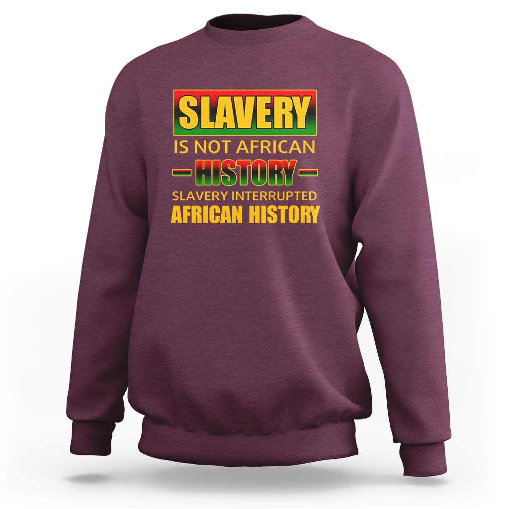 Maroon crewneck sweatshirt with bold front graphic slogan and ribbed cuffs