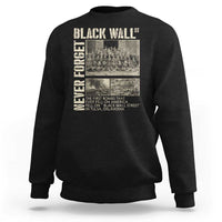 Black crewneck sweatshirt with large vintage-style back graphic print