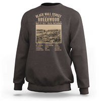 Brown crewneck sweatshirt with large vintage poster graphic on chest