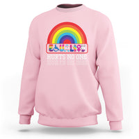 Light pink sweatshirt with rainbow circular Equality graphic and HURTS NO ONE text