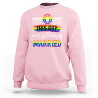 Light pink crewneck sweatshirt with rainbow pride front graphic and “Married” text