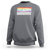 Charcoal gray crewneck sweatshirt with “GAY AGENDA” weekly schedule graphic on chest