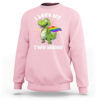Light pink crewneck sweatshirt with colorful dinosaur "Love My Two Moms" graphic