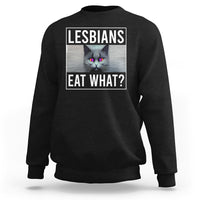 Black crewneck sweatshirt with cat graphic and text 'LESBIANS EAT WHAT?' on chest
