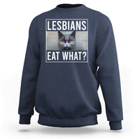 Navy crewneck sweatshirt with cat graphic and text 'LESBIANS EAT WHAT?' on chest