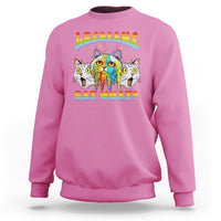 Azalea pink crewneck sweatshirt with rainbow "Lesbians Eat What?" cat graphic