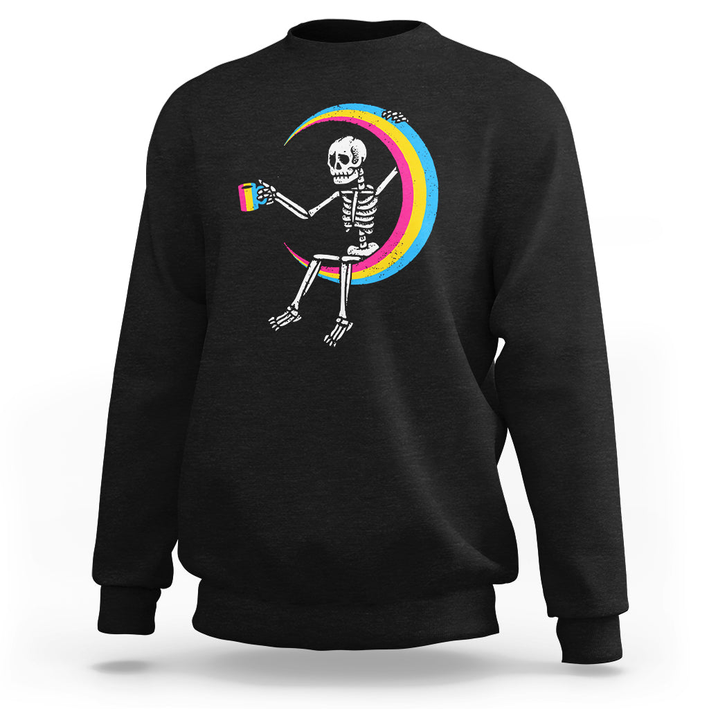 Black crewneck sweatshirt with skeleton drinking coffee graphic and rainbow arc print