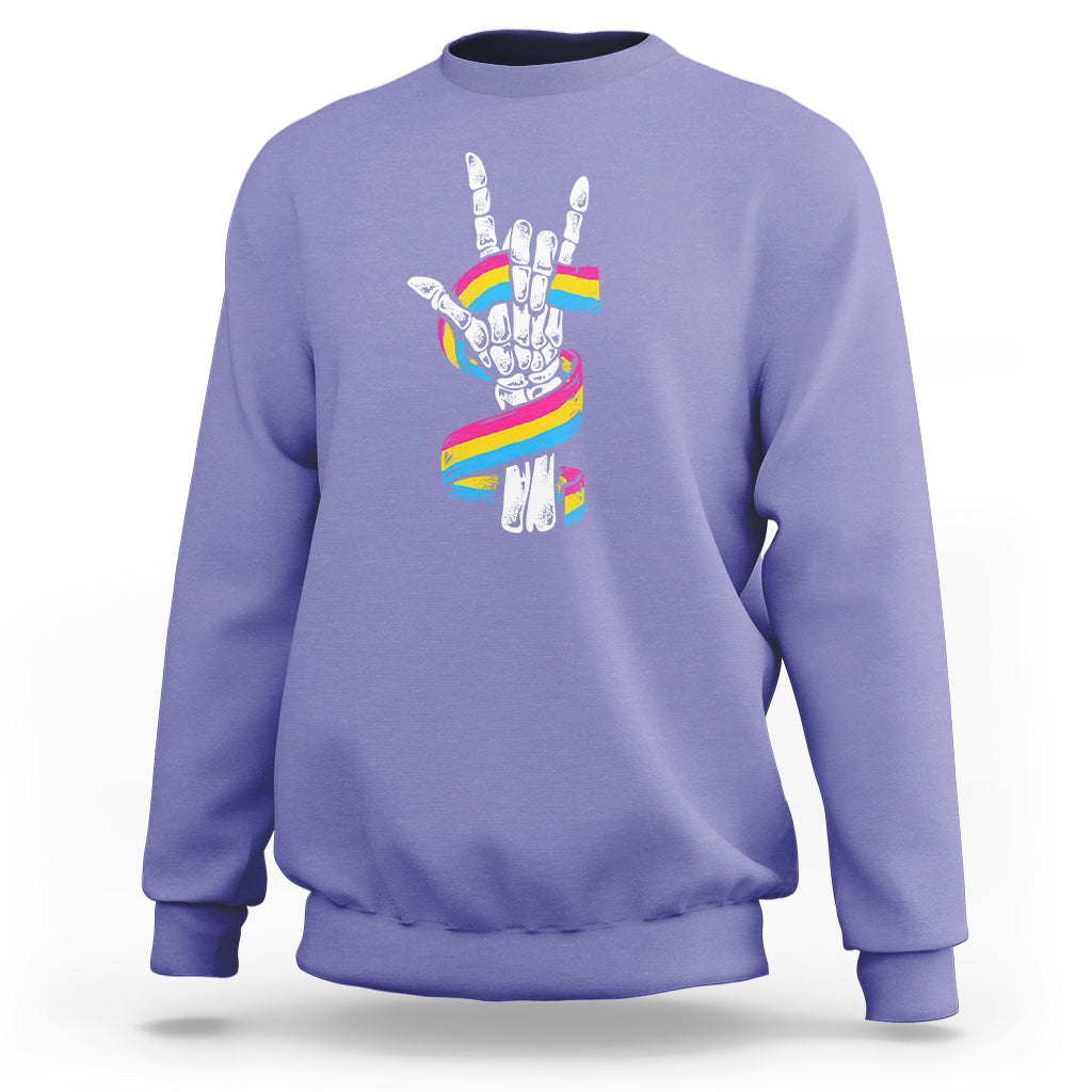 Violet sweatshirt with skeleton rock hand graphic and pride rainbow flag colors on back