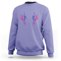 Violet crewneck sweatshirt with colorful hand graphic on chest