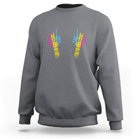 Charcoal gray sweatshirt with colorful skeletal rock hand graphic on back