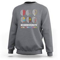 Charcoal gray crewneck sweatshirt with multicolor brain icons and “We All Think Differently”