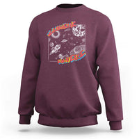 Maroon crewneck sweatshirt with colorful space brain graphic on the chest