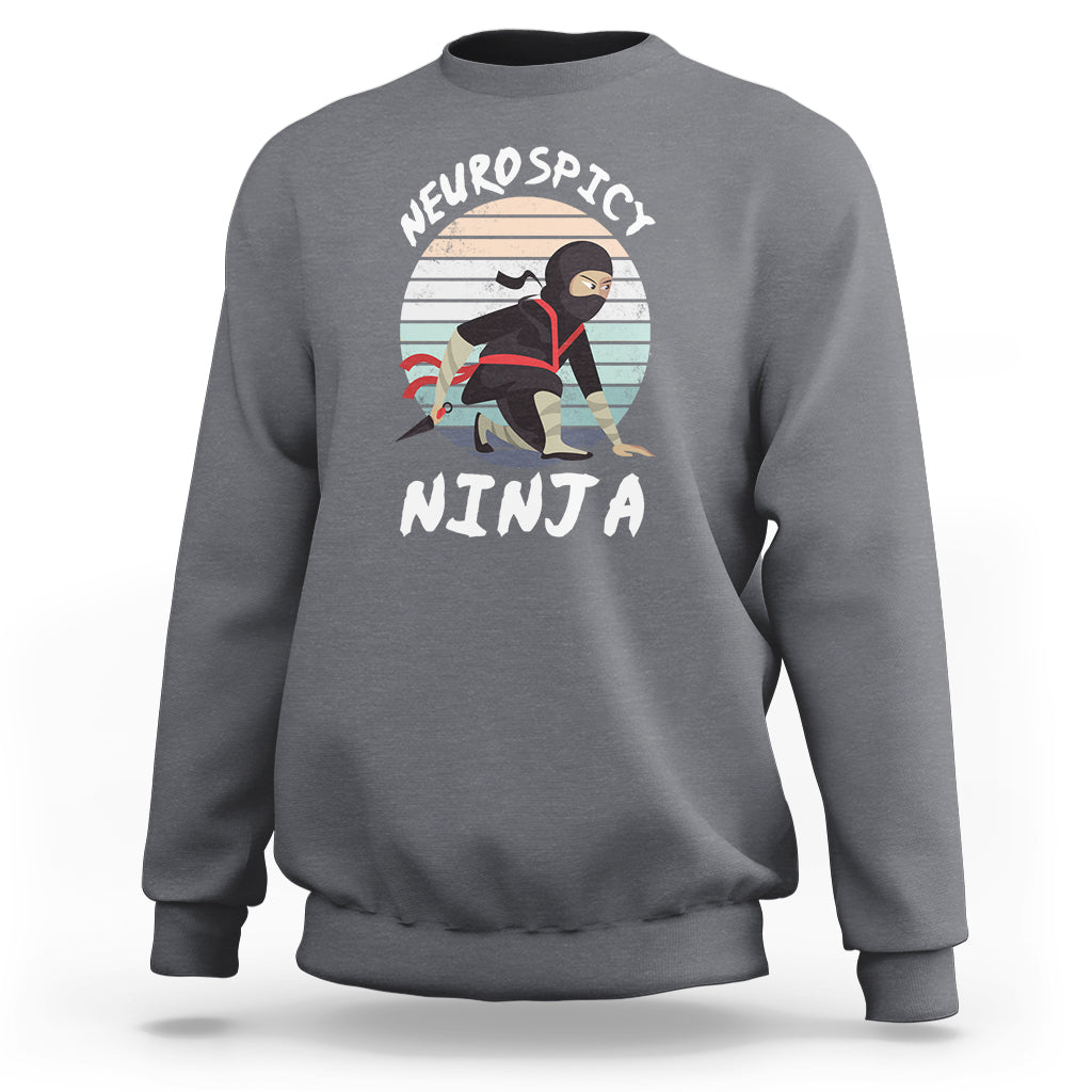 Charcoal gray crewneck sweatshirt with “Neurospicy Ninja” graphic on chest